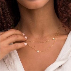 Jennifer  Zeuner  Double Star gold necklace